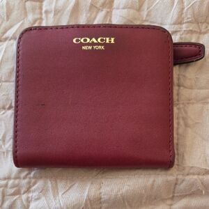 COACH Burgundy Zip Wallet with Gold Logo